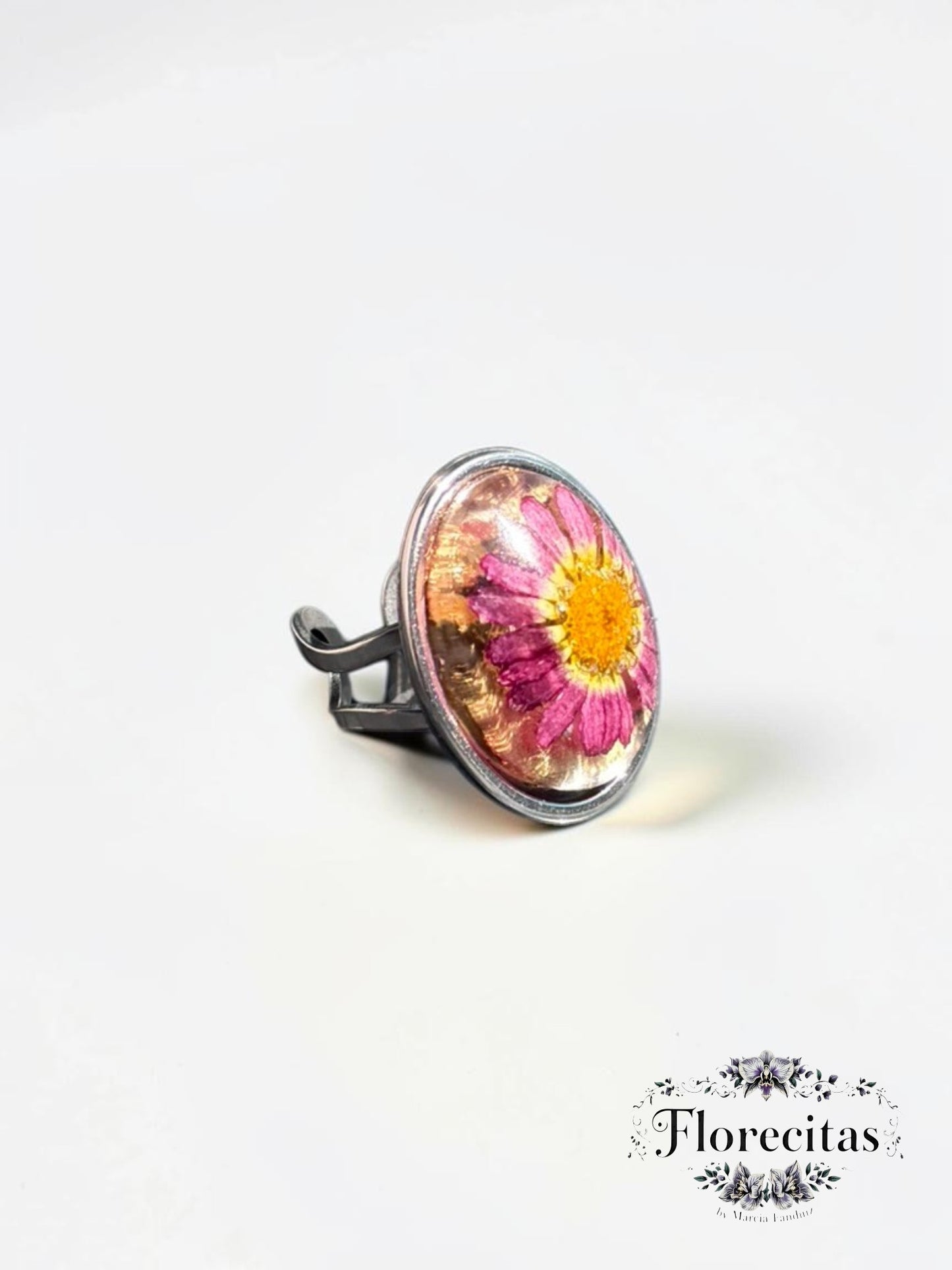 Oval Shaped Magenta and Yellow Daisy with Silver Frame Ring