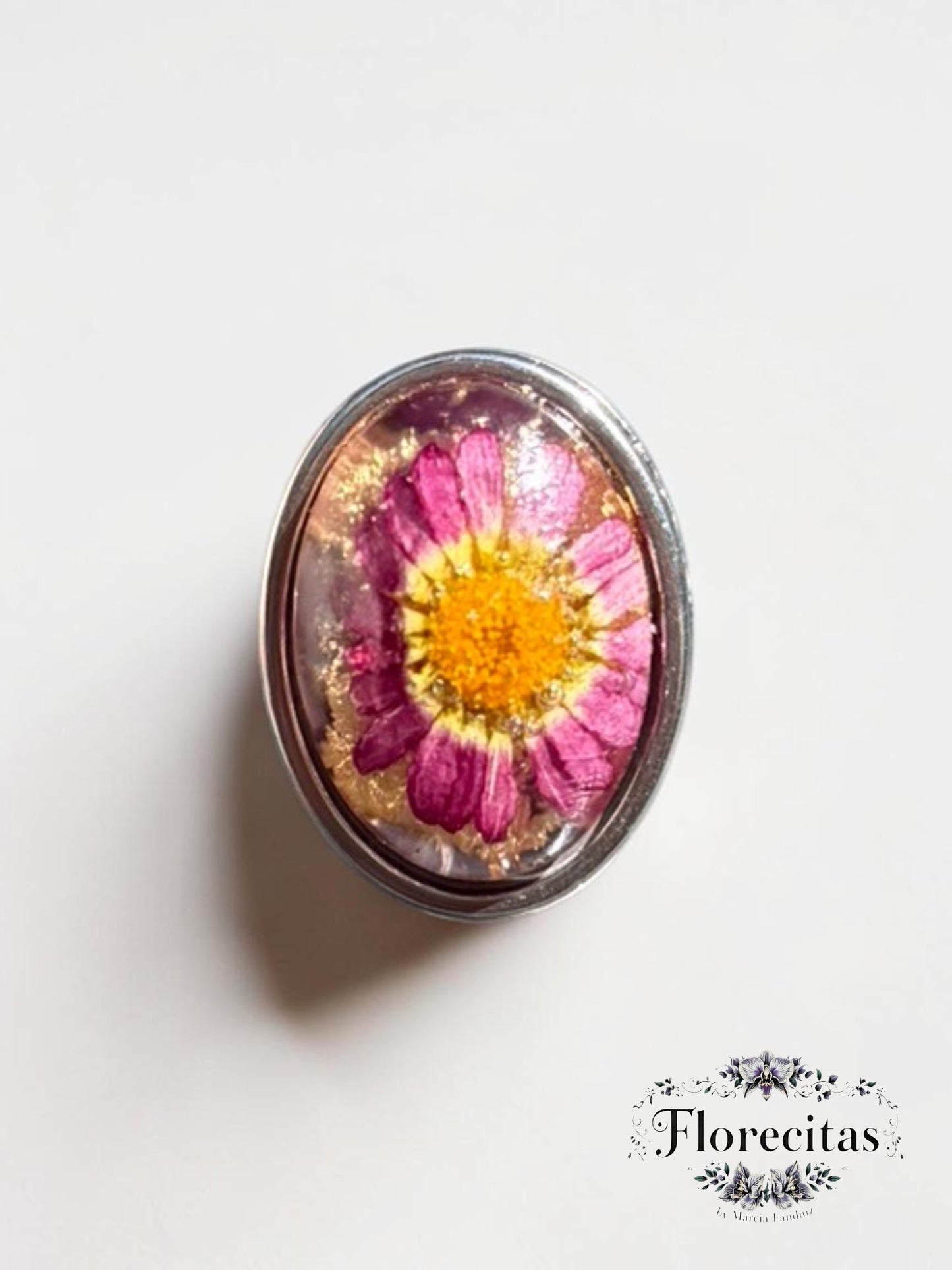 Oval Shaped Magenta and Yellow Daisy with Silver Frame Ring